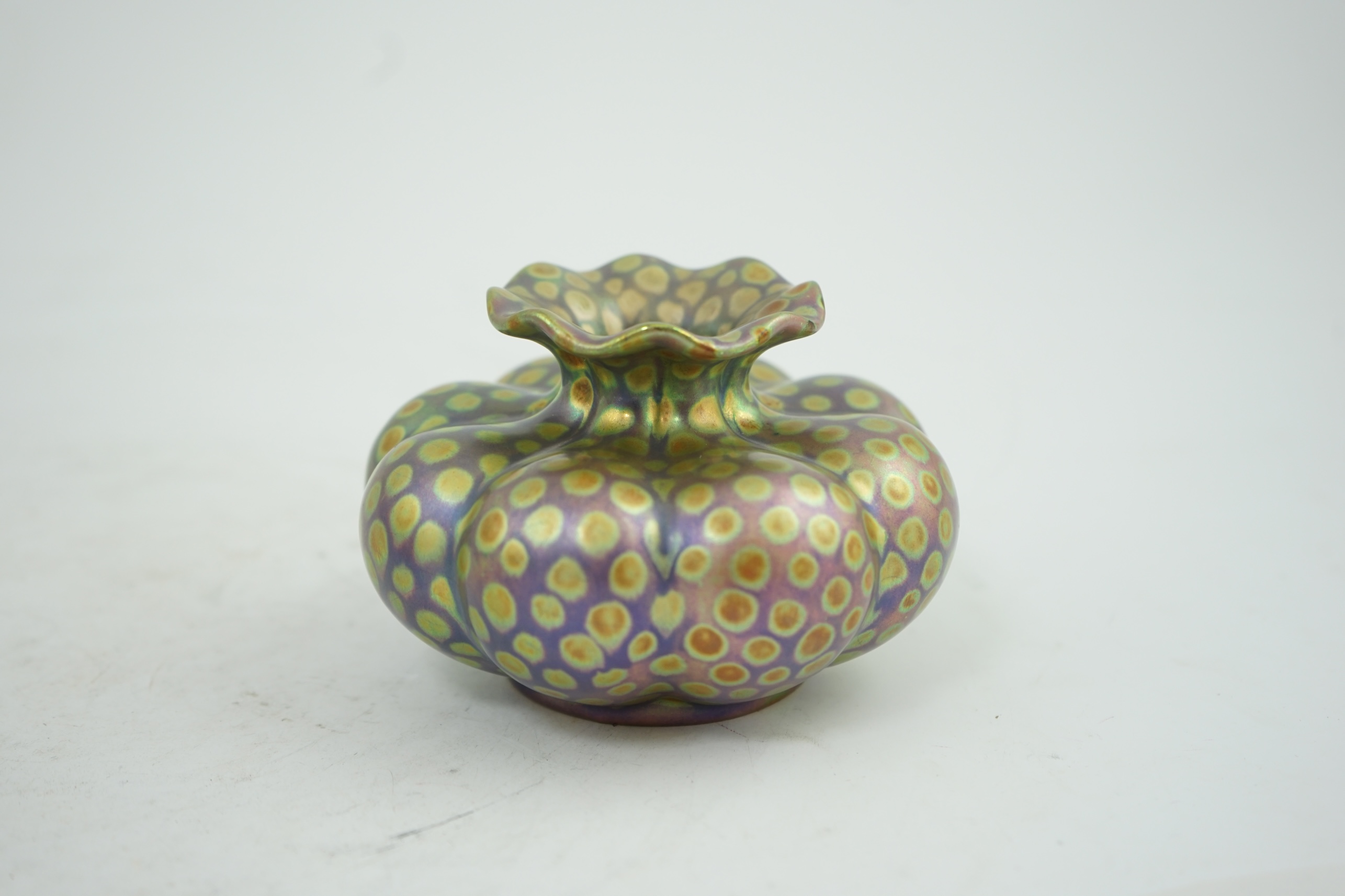 A Zsolnay spotted lustre pumpkin shaped vase, early 20th century